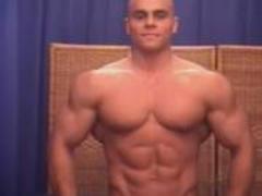 Bald body builder shows off hellos amazing body