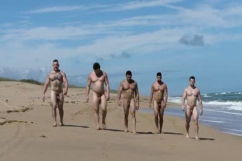 Muscle males On The Beach