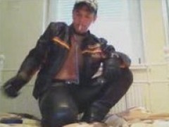 Leatherchap smoking and jerking off with poppers in leather